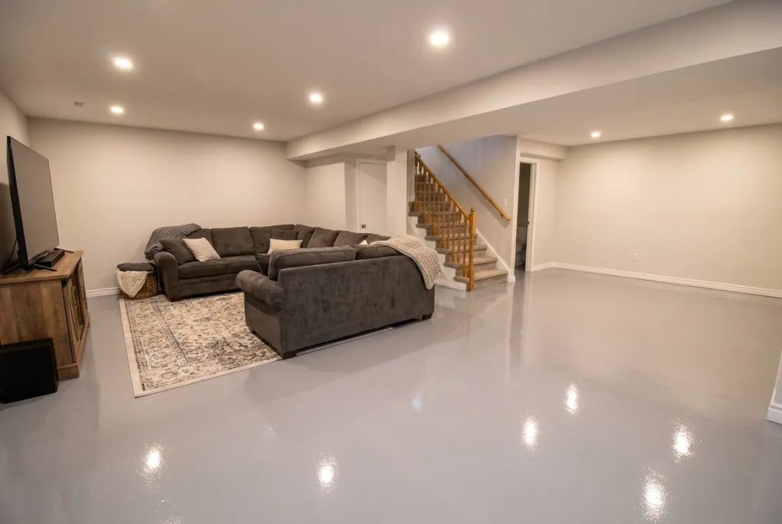 Finished basement with a glossy seamless epoxy floor